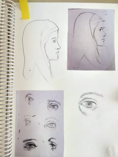 Pencil practice from a sketchbook, with pasted reference images visible beside the drawings. The references are study material.
