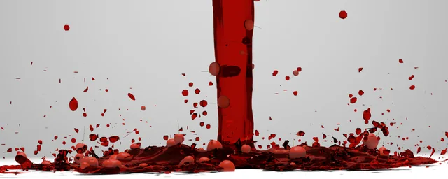 Cherries suspended in a red liquid splash.