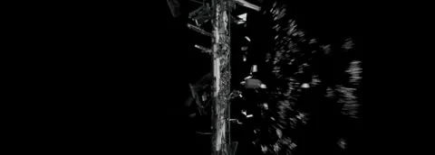 A brief monochrome study of a form breaking into fragments.